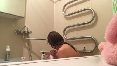 The bathroom filming hot MILF taking shower