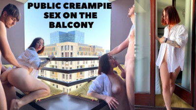 Public creampie sex on the balcony